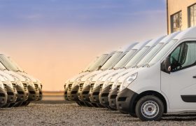 commercial delivery vans in two rows