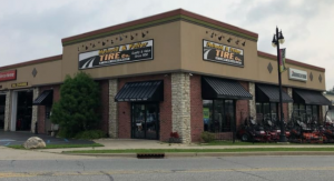 HEINOLD & FELLER TIRE CO INC Logo